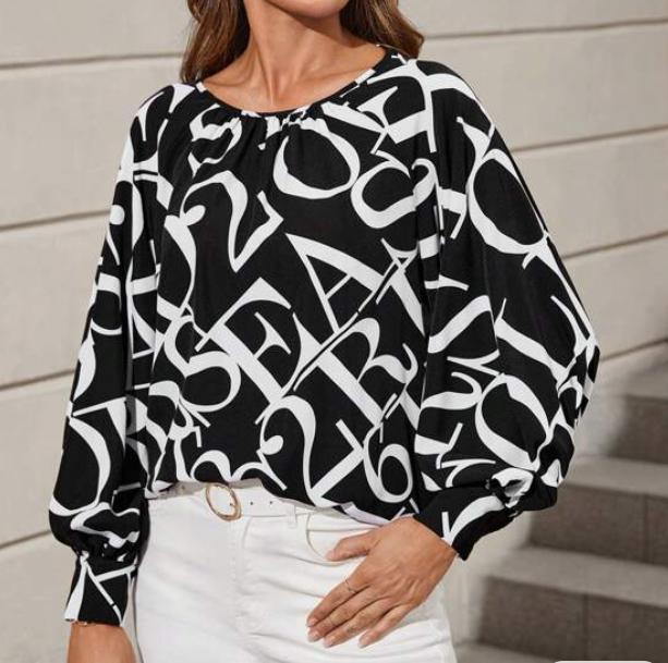 Blusa Estampada en Blanco y Negro con Manga Raglán ✨