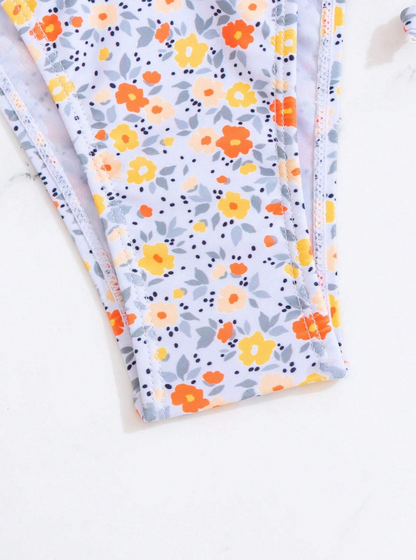 🌼 Top de Bikini Halter con Diseño Floral + Bottom con Lazos Laterales