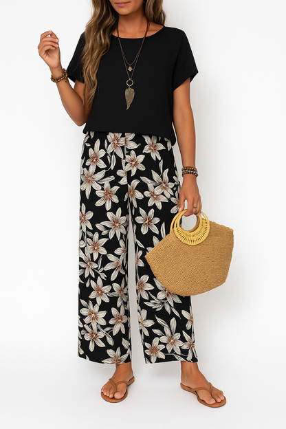 🌿 Conjunto de Dos Piezas con Blusa Unicolor y Pantalón Floral